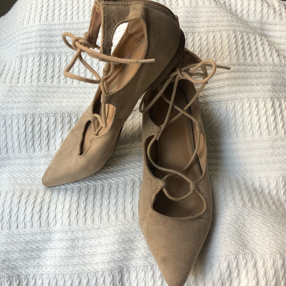 Tan lace-up flats